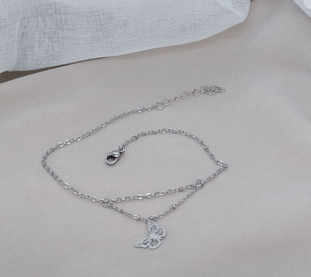 Chaîne de cheville en acier inoxydable ornée d'un pendentif "papillon".